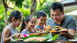 © AlgoCreative - Families enjoying traditional Thai dishes during joyful meal together
