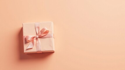 Aufkleber - A delicately tied pink ribbon adorns a blush-colored gift box, resting on a smooth peach background, perfect for conveying a message of celebration or appreciation.