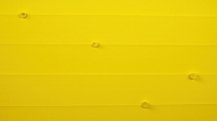 Aufkleber - Vibrant Yellow Surface with Subtle Textural Detail and Small Circular Elements