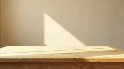 Aufkleber - Sunlight illuminates a rustic wooden table against a neutral backdrop, offering a serene and minimalist display space.