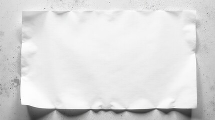 Poster - Blank Crumpled Paper Sheet on a Textured Surface, Ideal for Your Design Projects or Presentation Background