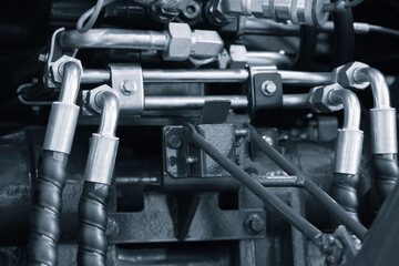 Aufkleber - Close up of engine with many tubes and wires, industrial service concept background