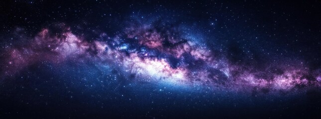 Celestial Symphony: The Milky Way Galaxy unfurls in a mesmerizing panorama, a ribbon of cosmic dust and incandescent stars painted across the deep, infinite canvas of space.