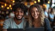 © Knight - bible study happy young multiethnic cheerful young couple using laptop in cafe outdoors