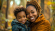 © Jhati - Happy african american mother and son smiling outdoors in autumn joy love fall park cute smile child