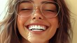 © Johannes - Casual cheerful woman with eyeglasses smiling at camera on cream background. Close up of happy young woman laughing with eyeglasses. Beautiful girl having fun with closed eyes showing a big grin.