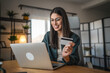 © Miljan Živković - businesswoman work from home and buy online on laptop and credit card