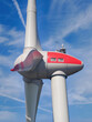 © Comofoto - Close-Up View of a Wind Turbine – Renewable Energy for a Sustainable Future