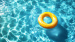 © mingnimit - Bright yellow float ring in clear blue swimming pool