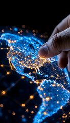 Wall Mural - fingertip touching illuminated north america on a digital globe