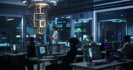 Computer Engineering Team Working on Quantum Hardware Development, Analyzing Data on Advanced AI Software in an Industrial Laboratory. Diverse Specialists Focusing on Innovation and Technology