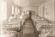 © malayeka - Sepia-toned photo of a long ward in a historical hospital with numerous infant cribs and nurses attending to babies.