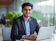© Shivani - young corporate man using laptop
