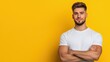 © Watercolor_Kawaii - Young Man with Entrepreneurial Mindset Posing with Confidence Against Bright Yellow Background