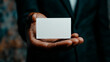 © Daniella - Person Presenting Blank White Rectangular Card