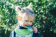 © Austockphoto - Little girl eating gumleaf