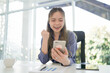 © mojo_cp - Asian woman gen z excited good news on mobile phone