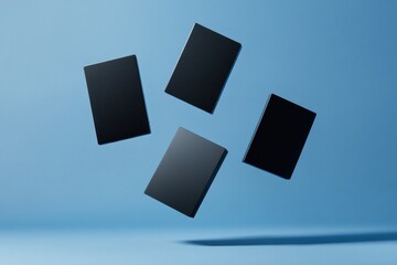 Leinwandbilder - Zero-Gravity Tech Showcase Minimalist Black External Hard Drives Floating in Digital Innovation Space - Next-Gen Data Storage Solutions