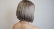 © Abeto_21 - Stylish Blonde Bob Hairstyle Rear View with Straight Lines and Texture