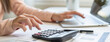 © KMPZZZ - Deduction planning, debt asian young woman  hand using laptop computer, calculator calculating money balance from bill and income, cost budget expenses for pay money form personal individual on table.