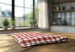 © Gustav - Rustic Wooden Table with Red and White Checkered Cloth in Bright Kitchen