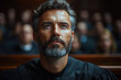 © Platoo studio - thoughtful man with beard and formal attire listens intently in courtroom setting