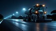 © mitarart - Close-Up of a Road Paver Machine Spreading Asphalt at Night
