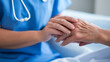 © Cozy Art - Nurse holding patient’s hand in hospital