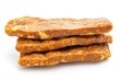 © Юля Бурмистрова - Delicious organic tempeh stacked on a clean white background ready for culinary exploration