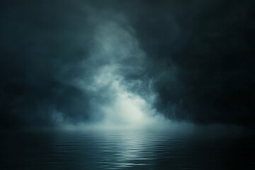 Wall Mural - dark, moody seascape with fog and light reflecting on water.