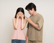 © Chanakon - Bad relationship unhappy asian couple quarreling in various action gesture standing on isolated white background. Shouting angry man and woman stressed has problem in Married life