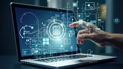 Programmer hands interacting with digital system architecture visualization on laptop screen