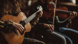 A photo of an intimate acoustic session at Celtic Connections Festival, where a guitarist and a violinist sit close together, deeply immersed in their performance