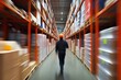 © Andrii  - Warehouse worker in action within storage facility