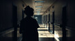 © adynue - silhouette of nurse walking in hospital corridor with cinematic lighting effects