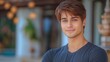 © QuietWord - portrait of a Caucasian muscular handsome young man smiling at cozy home