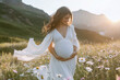 © amrets - Maternity photoshoot of a beautiful pregnant woman in natural outdoor. Baby bump