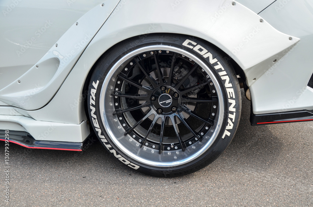 Custom wheel setup of Honda Civic modern car featuring a black rim and ...