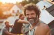 © The Little Hut - Smiling man with curly hair working on a sunny roof in a residential area during home renovation : Generative AI
