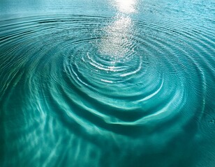 Wall Mural - turquoise water surface with diverging circular waves play of light and shadow and space for text wa