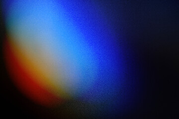 Wall Mural - colorful lens flare on black background.