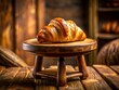 © Four888 - Delicious Buttery Croissant on Rustic Wooden Cake Stand - Tilt-Shift Photography