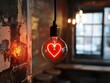 © Kaulo - Heart-shaped light bulb in cafe