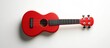 © Generative AI - Bright red ukulele on a clean background portraying musical creativity and vibrant sound : Generative AI