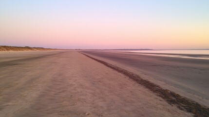 Fototapete - Stunning empty beach at sunset with gentle waves and a peaceful horizon waiting for tranquil moments Generative AI