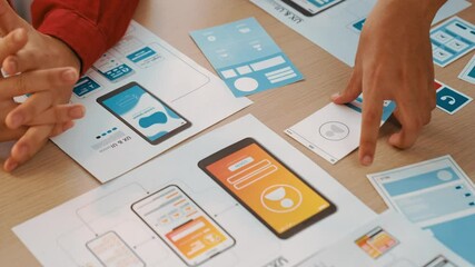 Wall Mural - panorama video of startup company employee planning on user interface prototype for mobile applicati