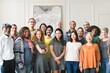 © Rawpixel.com - A team of diverse people doing a group photo