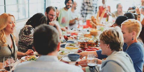 Wall Mural - a diverse group of people enjoying a vibrant dinner party. this lively gathering features men and wo