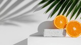 Minimalist Tropical Still Life with Orange Halves and Palm Leaf Casting Shadow on White Wall