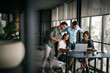 © NDABCREATIVITY - Business project team working together at meeting room at office